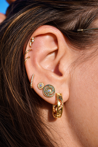 Rising Sun Huggies in 18k gold
