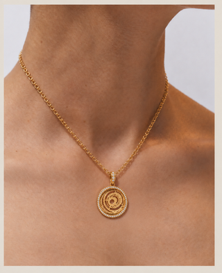 Rising Sun Pendant in 18k gold, worn
