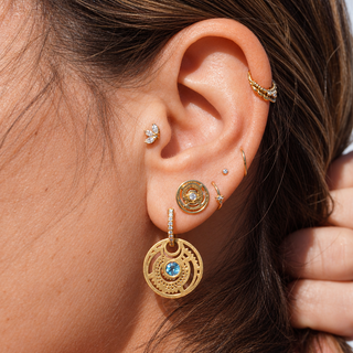 Rising Sun Studs in 18k gold, paired in a Malibu Soul ear stack